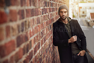 Buy stock photo Man, portrait and urban style by brick wall downtown for aesthetic, modern and vacation for city culture. Male person, trendy winter outfit for streetwear fashion for creative career in New York