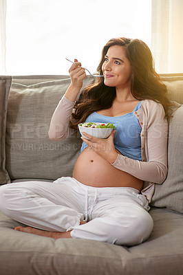 Buy stock photo Woman, sofa and pregnant with salad for eating with healthy diet in living room with smile for relax with maternity. Motherhood, child and parent on couch in home with prepare for baby with wellness