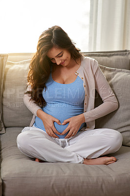 Buy stock photo Shot of a young pregnant at home