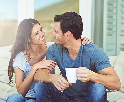 Buy stock photo Coffee, conversation and couple on outdoor sofa for communication, bonding or love on patio in morning. Happy, talking and young man and woman laugh and drinking cappuccino, latte or espresso at home