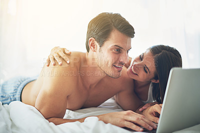 Buy stock photo Couple with laptop, streaming and relax in home with technology, wifi and happy to chill together. Love, commitment and relationship with man and woman in bedroom with film website subscription