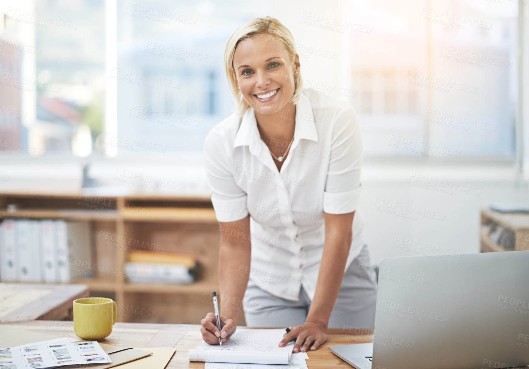 Buy stock photo Portrait of a businesswoman working in her office