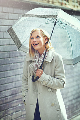 Buy stock photo Umbrella, city rain and excited woman with happiness on a sidewalk from winter weather. Happy female person, raining and travel on a urban road outdoor in Cape Town on holiday with freedom and joy