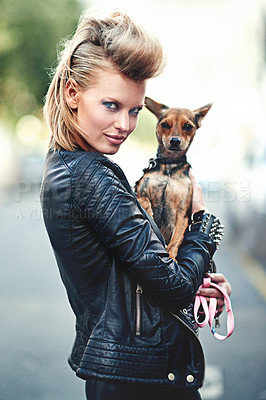 Buy stock photo Woman, portrait and leather jacket with pet, smile and rock n roll for unique in punk fashion and love for pet chihuahua. London, person and face in funky clothes in town and care for domestic animal