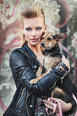 Buy stock photo Dog, portrait and confident woman in fashion in city and bonding with chihuahua in cool style. London, designer and face in edgy leather clothes in town, unique and care for pet animal by street art