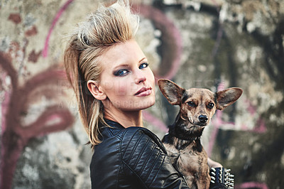 Buy stock photo Dog, portrait and punk woman in fashion by graffiti wall and bonding love with chihuahua in city. London, designer and face for leather clothes in town, unique and care for pet animal by street art