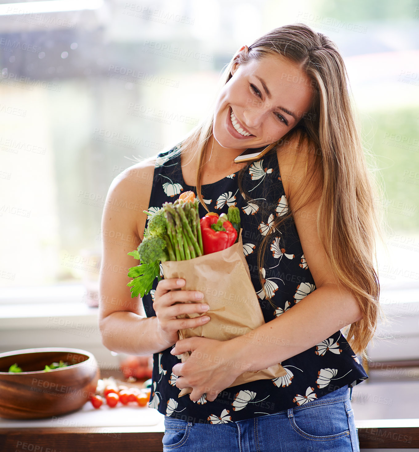 Buy stock photo Kitchen, phone call and woman with bag of vegetables for nutrition, healthy diet or update on dinner. Happy, female person and organic produce with technology for meal prep, cooking and communication