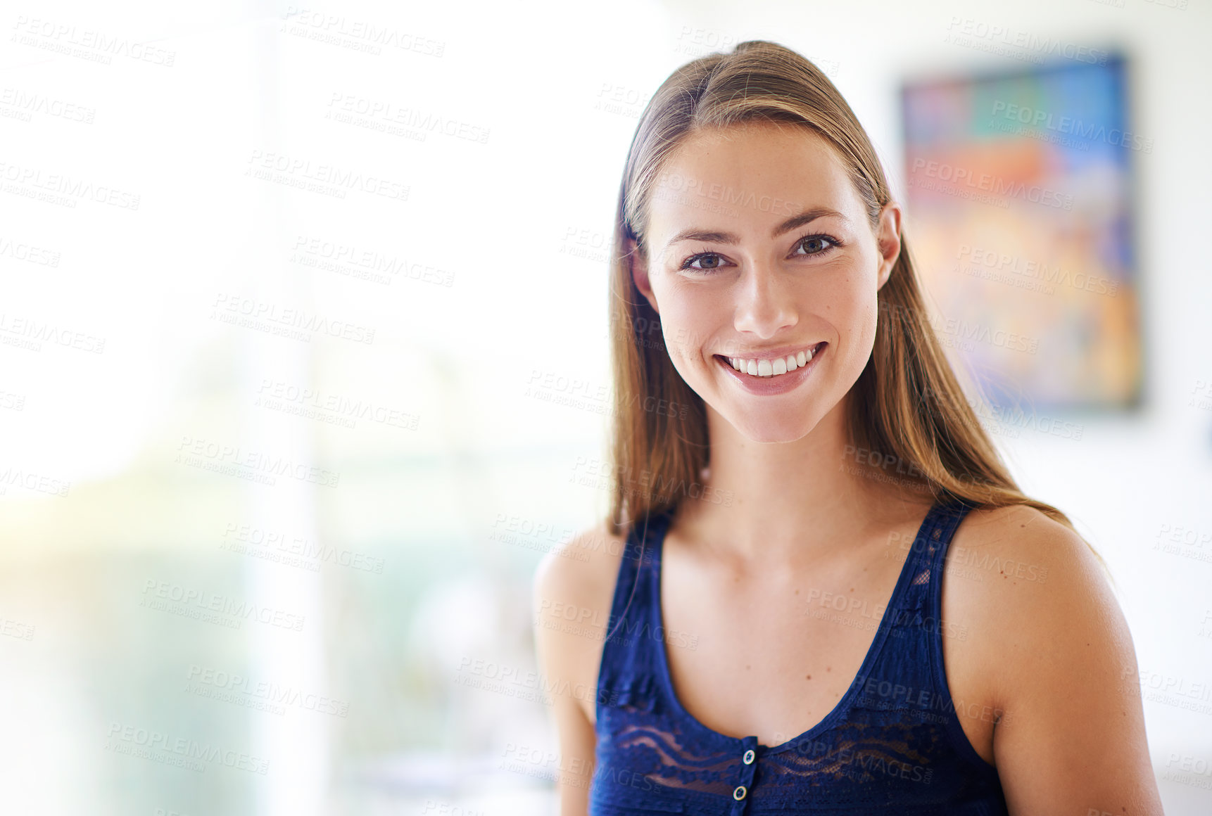 Buy stock photo Young, woman and portrait at house with smile to relax in living room as student for spring break on weekend. Happy, carefree and female person with confident comfort in campus dorm for calm peace