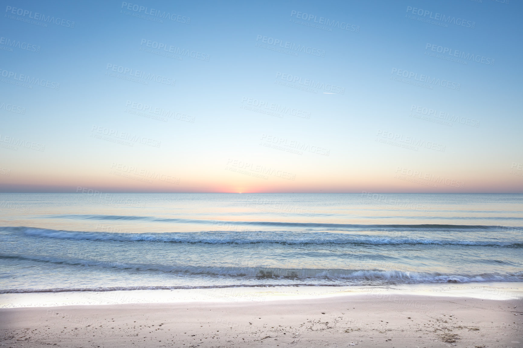 Buy stock photo Shot of a sunset over the ocean