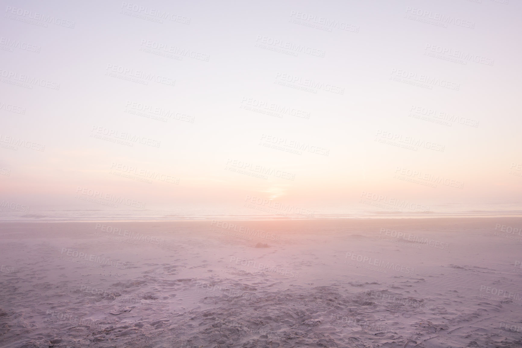 Buy stock photo Shot of a sunset over the ocean