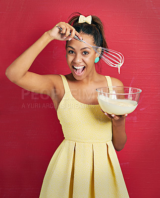 Buy stock photo Woman, portrait and baking or whisk in studio as housewife in dress for dessert snack, cooking or bowl. Female person, face and red background with mockup space for sweets candy, happiness or mock up