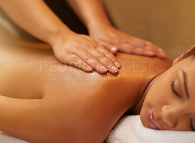 Buy stock photo Massage, back and shoulders in spa with girl on table with peace, wellness and luxury treatment. Masseuse, hands and calm woman relax on holiday or vacation in hotel with cosmetic service and care