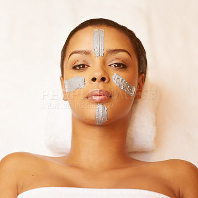 Buy stock photo Woman, portrait, and relax with face mask at spa for beauty, skincare or anti aging above on massage bed. Top view of calm or young female person in relaxation, facial treatment or cosmetics at salon
