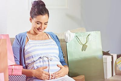 Buy stock photo Shot of a young pregnant woman at her baby shower