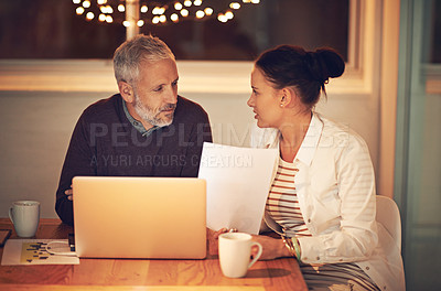 Buy stock photo Cropped shot of two colleagues working late at the office