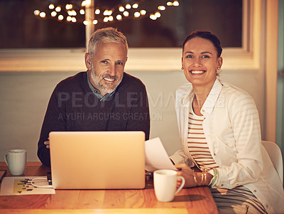 Buy stock photo Cropped portrait of two colleagues working late at the office