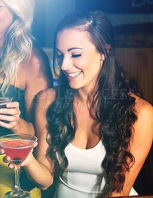 Buy stock photo Party, cocktail and nightclub with a young woman and friends drinking in celebration of the new year. Birthday, event and social with an attractive young female enjoying a drink while clubbing