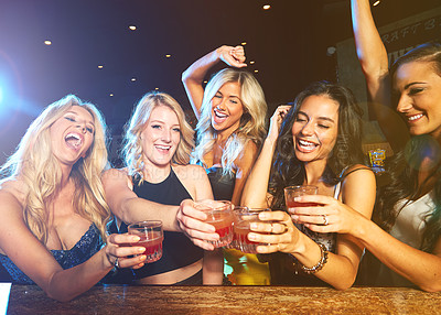 Buy stock photo Friends, party in nightclub with cocktail and toast drink, fun and happiness with women at new year celebration. Night, excited with alcohol cocktails and cheers with energy, dance and drinks.