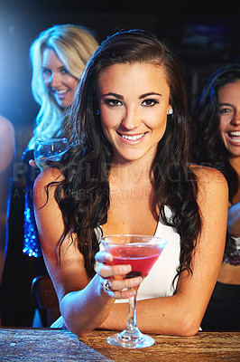 Buy stock photo Shot of a young woman partying in a nightclub