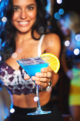 Buy stock photo Hand, cocktail and party with a young woman in a nightclub for a new year celebration or event. Blue, drink and glass with a female in a club, enjoying a birthday while drinking alcohol at night