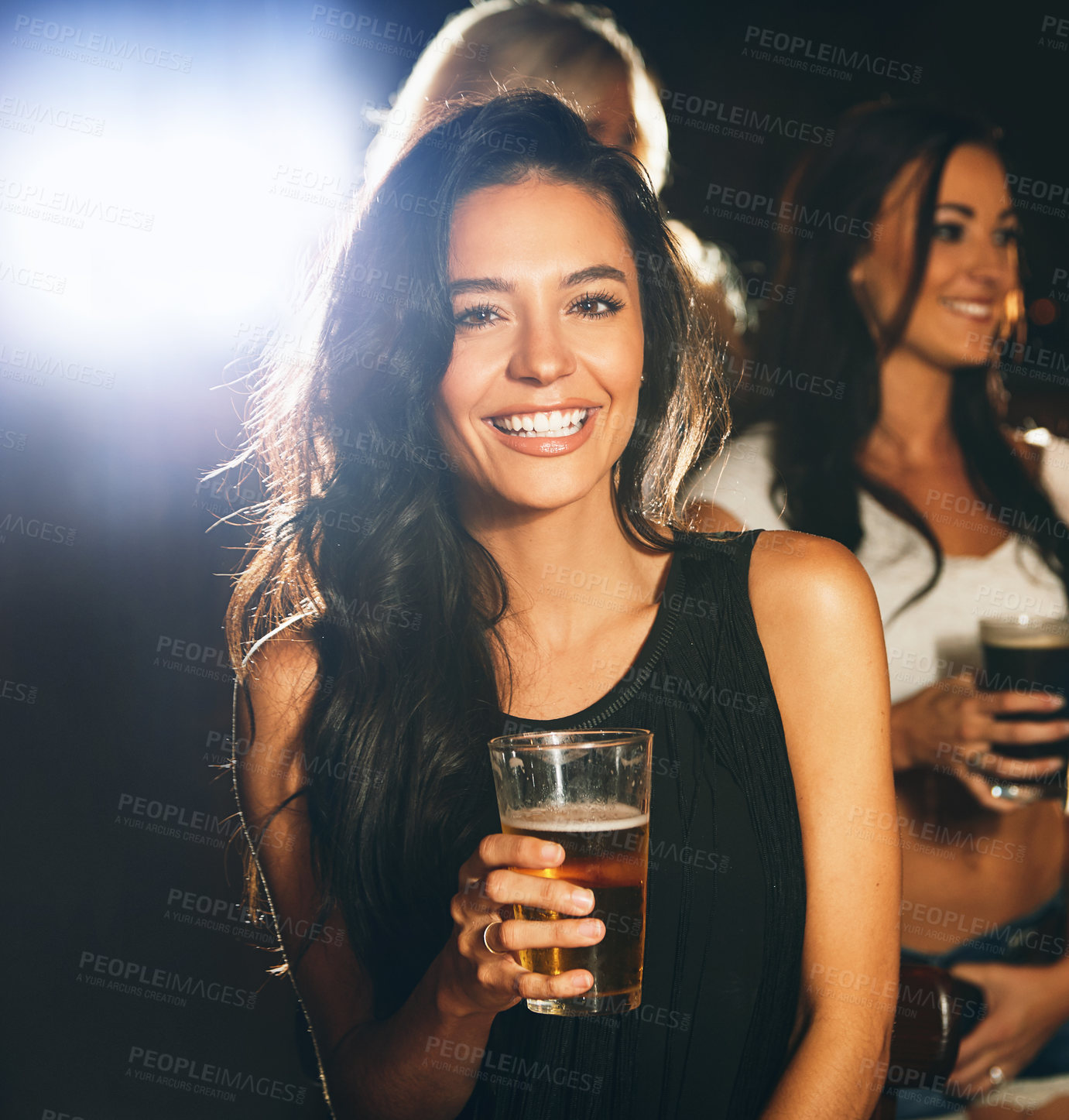 Buy stock photo Shot of a young woman partying in a nightclub