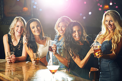 Buy stock photo Shot of young women partying in a nightclub