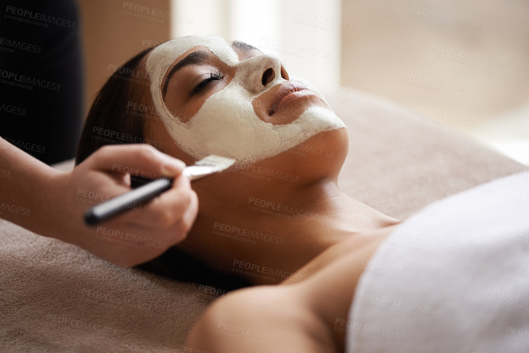 Buy stock photo Beauty, relax and woman with face mask at spa for glow, wellness and skincare routine with self care. Cosmetic, pamper and female person with natural clay facial dermatology treatment at salon.