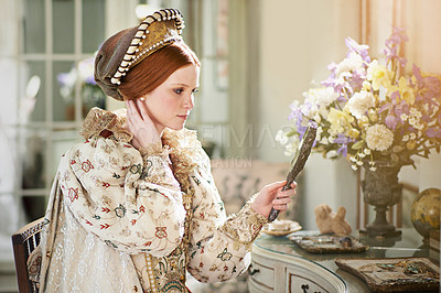 Buy stock photo Portrait, medieval and woman mirror in a home with queen, renaissance and reflection in a palace room. Luxury, bedroom and royal female person at morning with vintage and classic costume in history