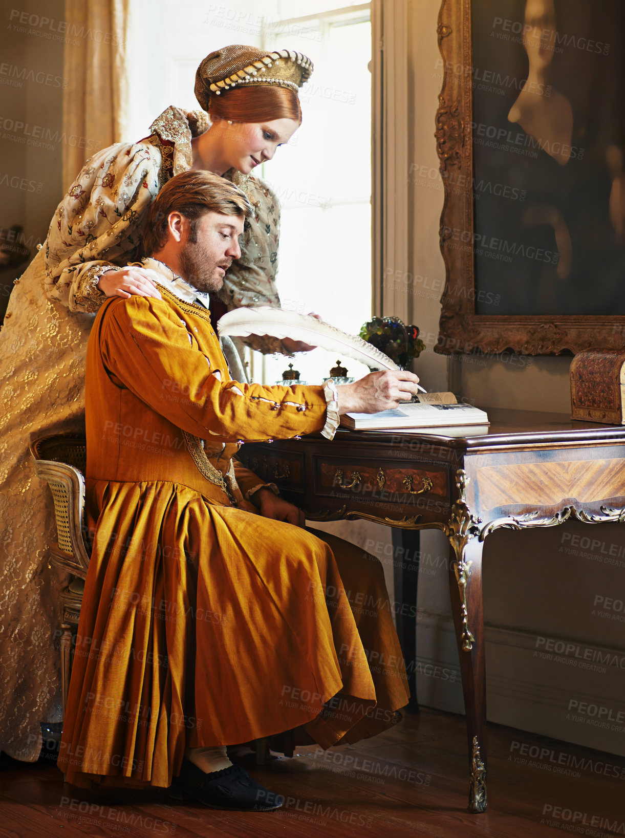 Buy stock photo Couple, feather and writing a letter, royal and relax in home for history in noble palace. People, quill and bonding or notes in journal for plan, renaissance and aesthetic for support in marriage