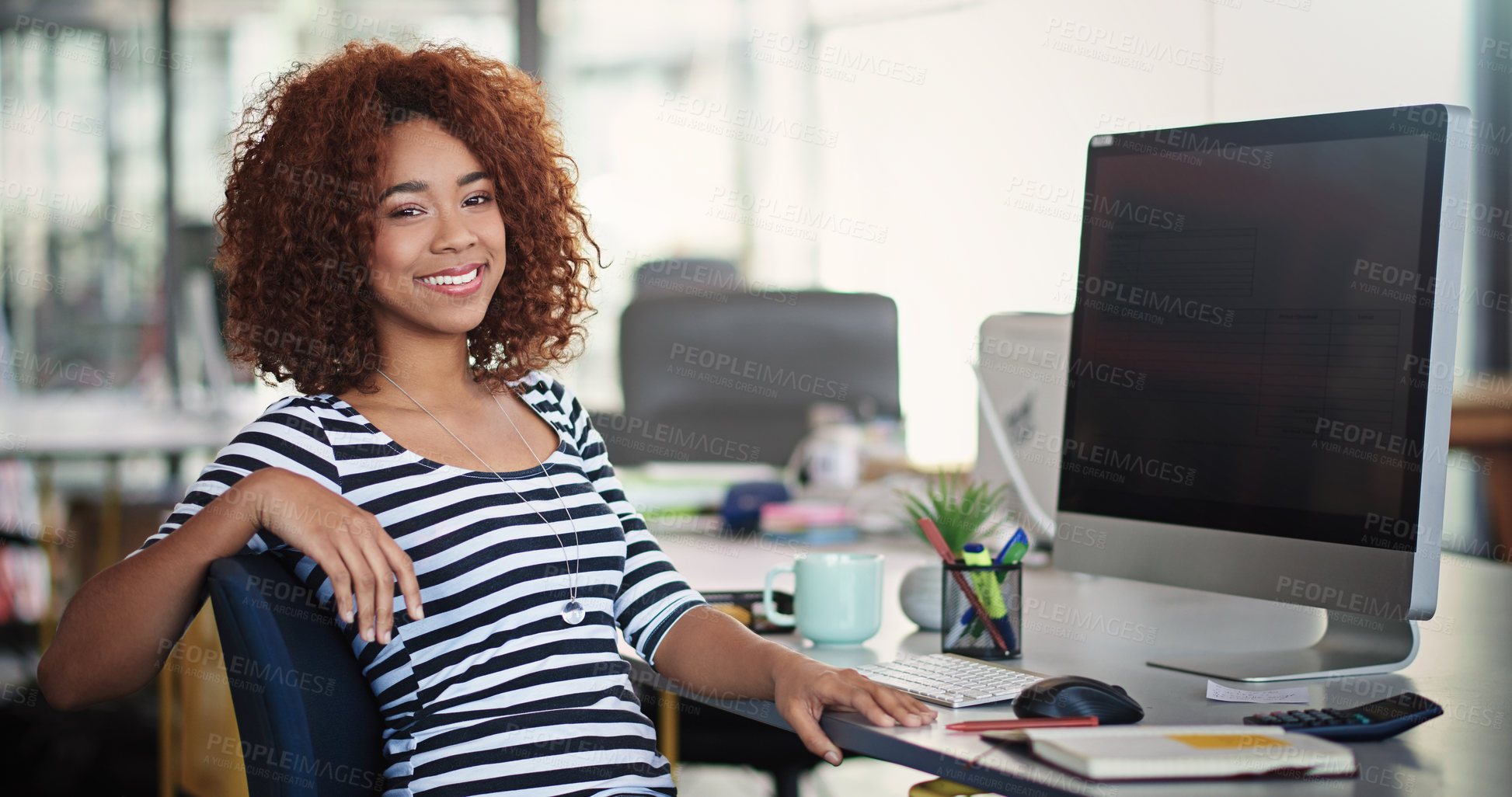 Buy stock photo Portrait of a designer sitting at her desk in an office