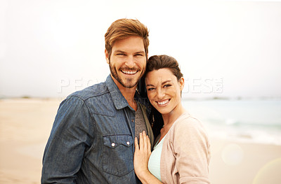 Buy stock photo Couple, portrait and embrace at beach for travel, romance and freedom together outdoors. Face, smile and happy woman hugging man on trip, vacation or holiday, bond or having fun standing in Bali