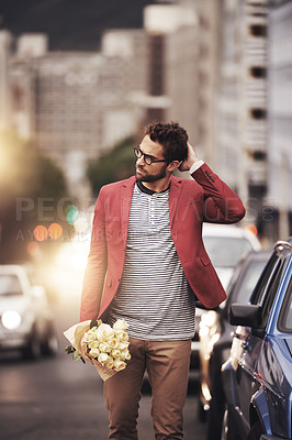 Buy stock photo Outdoors, man and bouquet of flowers with walking for gift, love or kind gesture in New York. Male person, downtown and bunch of roses with thinking for romance, idea or present on valentines day