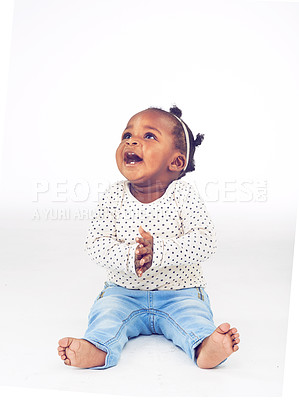 Buy stock photo Black baby, girl or excited to relax, laugh or vision for clapping, funny or idea on white background. Toddler, smile or on floor to imagine, curiosity or wonder of childhood on studio mock up