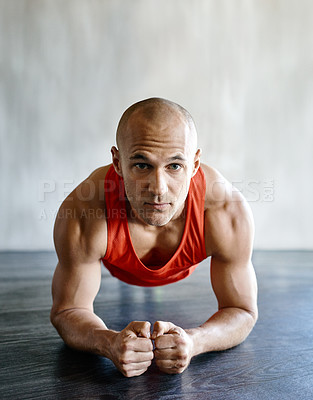 Buy stock photo Gym floor, portrait and fitness man focus on plank exercise, health motivation or core strength building for bodybuilding. Training, hard work commitment and person doing muscle development workout