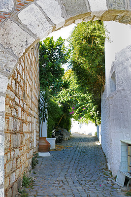 Buy stock photo Street, alley and vintage houses in urban Turkey as residential area or neighborhood. Old buildings, home and traditional or cultural architecture as tourist destination for holiday and journey