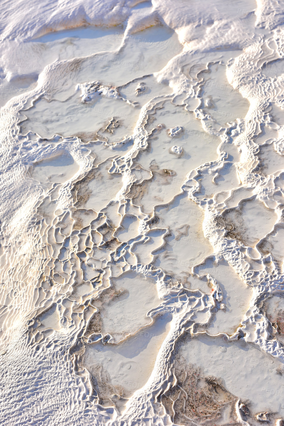 Buy stock photo Above view of travertine pools, terraces in Pamukkale Turkey. Traveling abroad, overseas for holiday, vacation, tourism. Closeup of cotton castle with carbonate mineral and fresh thermal spring water