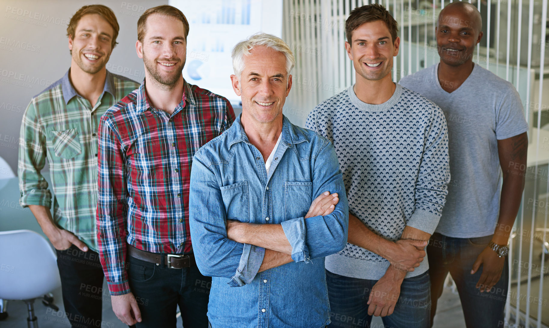 Buy stock photo Portrait of a group of colleagues standing together