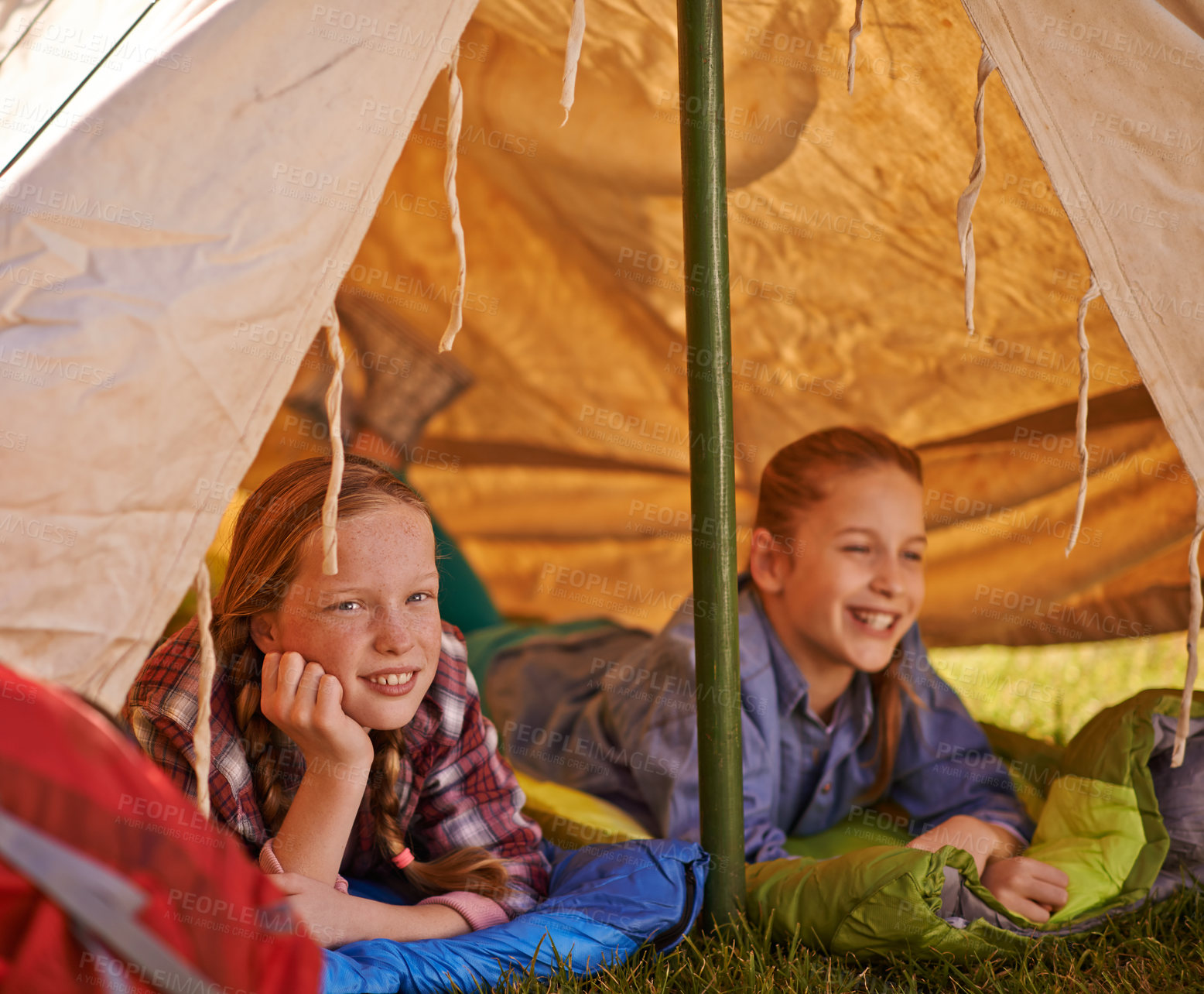 Buy stock photo Camping, adventure and kids in tent with happiness for outdoor activity, friends on vacation in park. Children, girls and countryside with smile for holiday, freedom with development in Europe