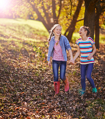 Buy stock photo Holding hands, smile or children of friends in nature walking on adventure together in Autumn. Happy, fun or girl kids exploring in outdoor park, field or garden for bonding on weekend trip in Canada