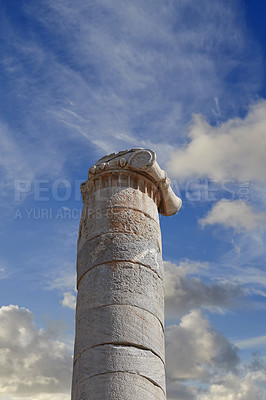 Buy stock photo Stone, tower or sculpture of ancient pillar in city of Turkey for tourism, traditional infrastructure or culture in town. Sky, history or structure design of relic architecture for travel destination