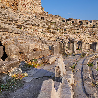 Buy stock photo Archeology, stone and landmark with building exterior ruins for travel destination, sightseeing and historical monument. Medieval, brick and colosseum architecture in Middle east for tourism or forum