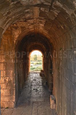 Buy stock photo Travel, culture and ancient architecture in Turkey as temple, structure and old building at destination. Landmark, monument and tunnel with tourism, history and stone for discovery, adventure or path