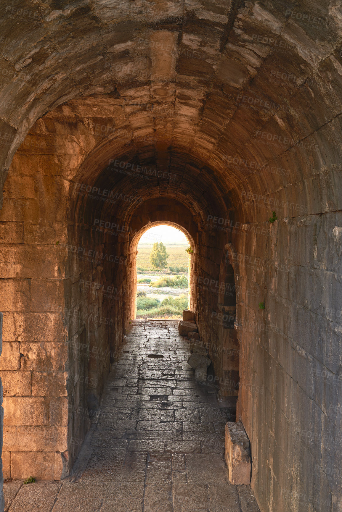 Buy stock photo Travel, culture and ancient architecture in Turkey as temple, structure and old building at destination. Landmark, monument and tunnel with tourism, history and stone for discovery, adventure or path