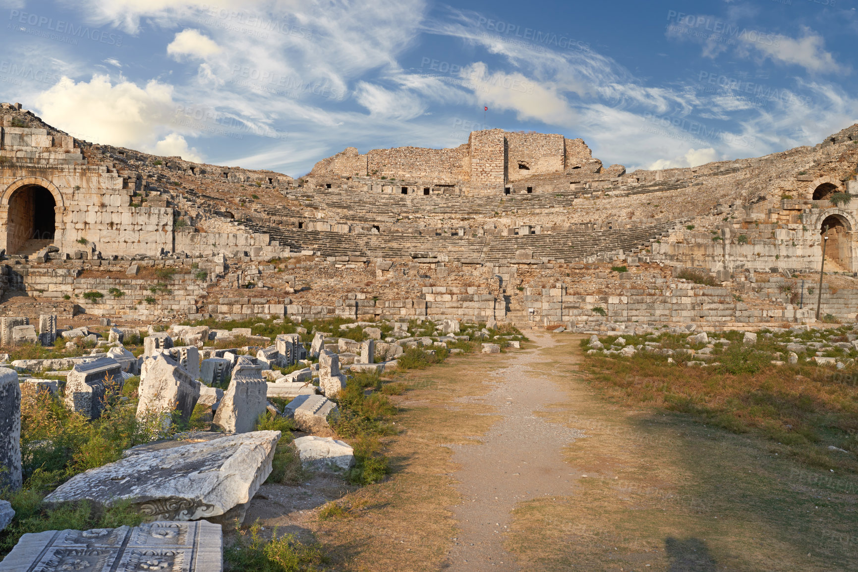 Buy stock photo Miletus, city theater and marble ruins for travel, history and ancient archeology outdoor in Turkiye. Tourism, building and architecture with amphitheater for culture, holiday and world heritage site