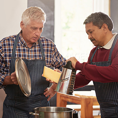 Buy stock photo Senior man, cooking and pot with cheese in kitchen for learning, chef class or sauce at old age home. Male person, friends or team in hospitality with mixing ingredients, apron or recipe at house