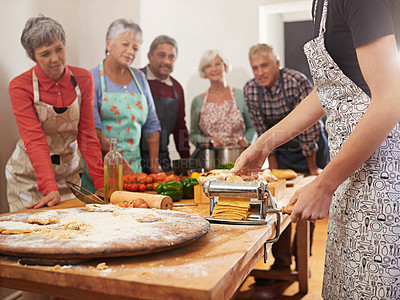 Buy stock photo Shot of a group of seniors attending a cooking class