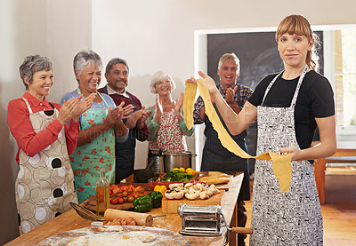 Buy stock photo Cooking class, pasta and portrait of people in kitchen learning recipe for cuisine, culinary and chef skills. Celebration, applause and happy men and women with ingredients, dough and food for dinner