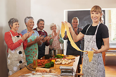 Buy stock photo Cooking, pasta and portrait of people in kitchen learning recipe for cuisine, culinary and chef skills. Retirement, teacher and and men and women with pastry ingredients, dough and food for dinner