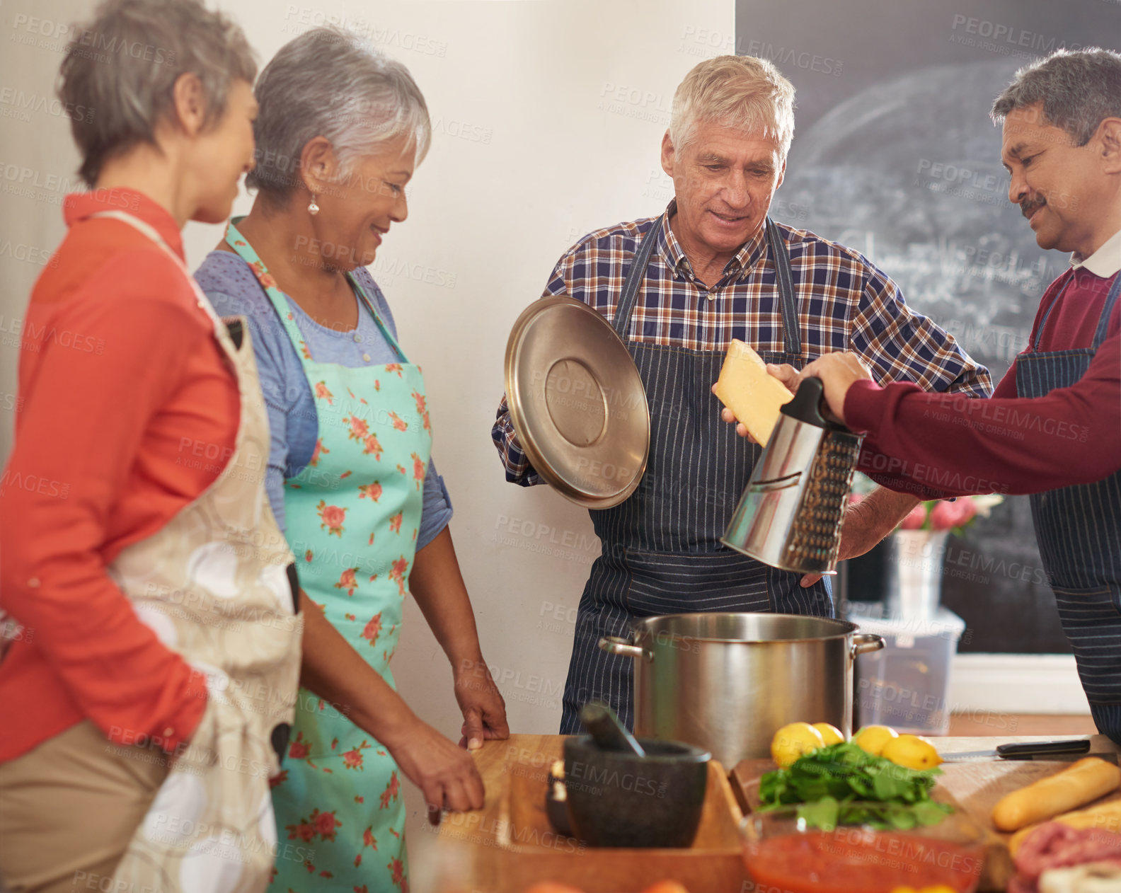 Buy stock photo Cooking, dinner and mature people in kitchen learning recipe for healthy diet, nutrition and wellness. Culinary, retirement and men and women with ingredients, vegetables or food for supper together