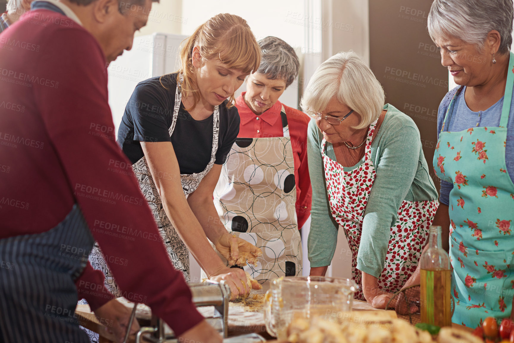 Buy stock photo Cooking class, food or senior people with chef in kitchen for nutrition, diet or easy recipe in retirement. Nursing home, learning and nutritionist volunteer show elderly group traditional pasta meal